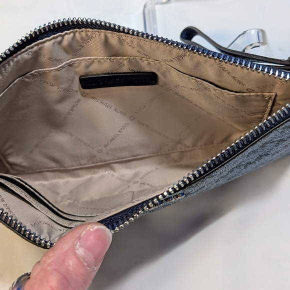 Michael Kors Blue Clutch Stylish and Compact